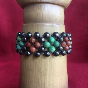 Turquoise, goldstone, and hematite bracelet